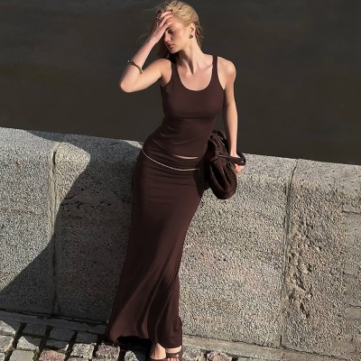 Solid color vest pleated skirt set