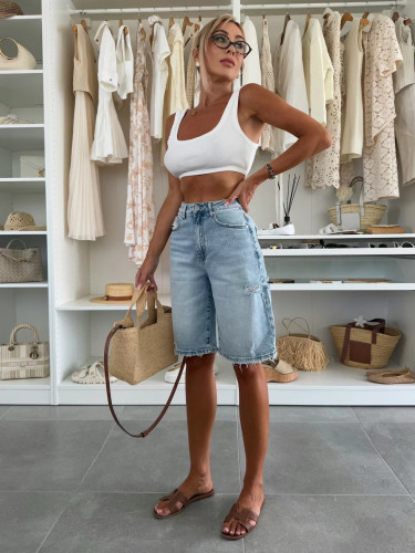 Loose washed ripped women's denim shorts