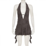 Deep V neck hanging, exposed back, torn hole, irregular jumpsuit, short skirt