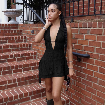 Deep V neck hanging, exposed back, torn hole, irregular jumpsuit, short skirt