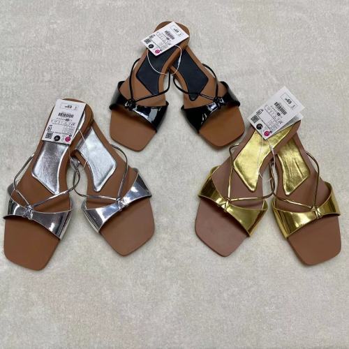 Wearing flat slippers outside