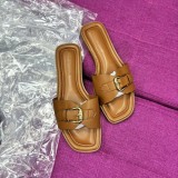 Flat bottomed women's flip flops with buckle on the outside