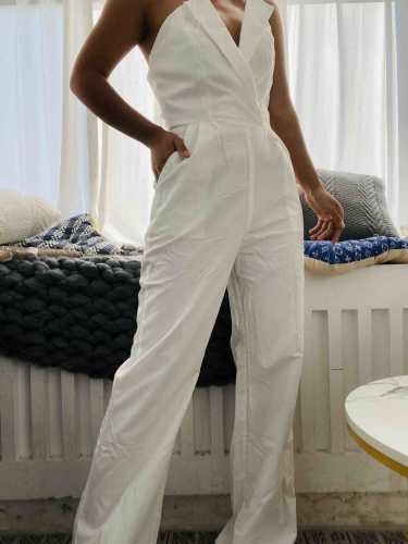 Chinese style jumpsuit with slanted collar and mid waist