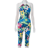 Printed circular neck strap with large open back seven part jumpsuit