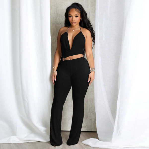 Circle decoration hanging neck and exposed waist jumpsuit