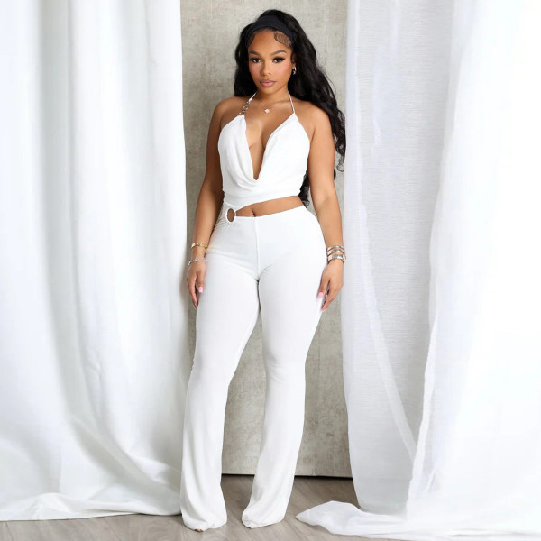 Circle decoration hanging neck and exposed waist jumpsuit