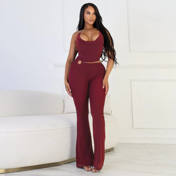 Circle decoration hanging neck and exposed waist jumpsuit