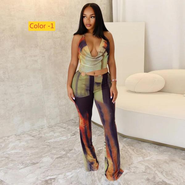 Circle decoration hanging neck and exposed waist jumpsuit