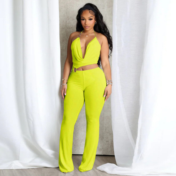 Circle decoration hanging neck and exposed waist jumpsuit
