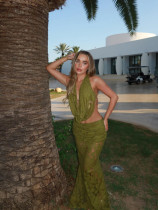 Printed hollow out dress with exposed back, hanging neck and tie up skirt Printed hollow out dress with exposed back, hanging neck and tie up skirt