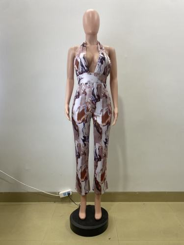 Printed neck hanging, backless waist cinched sleeveless jumpsuit