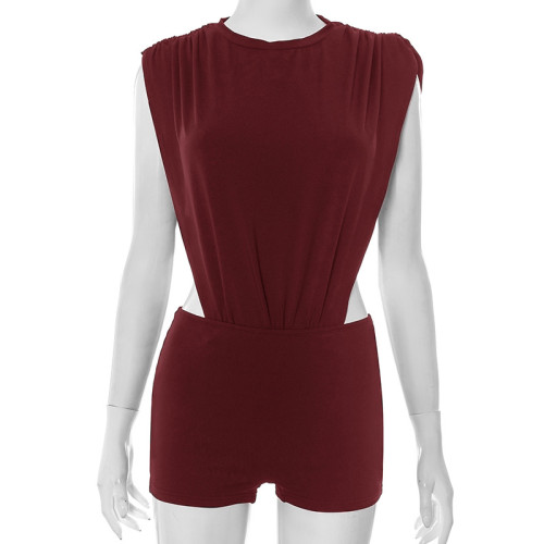 Inverted triangular pleated waist revealing jumpsuit, bag and hip set