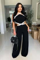 Wave line splicing sleeveless wide leg jumpsuit