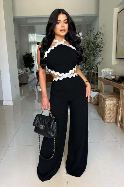 Wave line splicing sleeveless wide leg jumpsuit