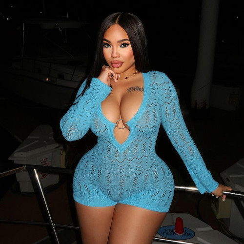 Hollow out woolen deep V-neck circular splicing micro flared long sleeved three part jumpsuit