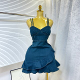 Elastic waist cinched denim camisole dress with ruffled edges and hip hugging skirt