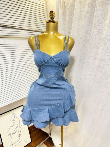 Elastic waist cinched denim camisole dress with ruffled edges and hip hugging skirt