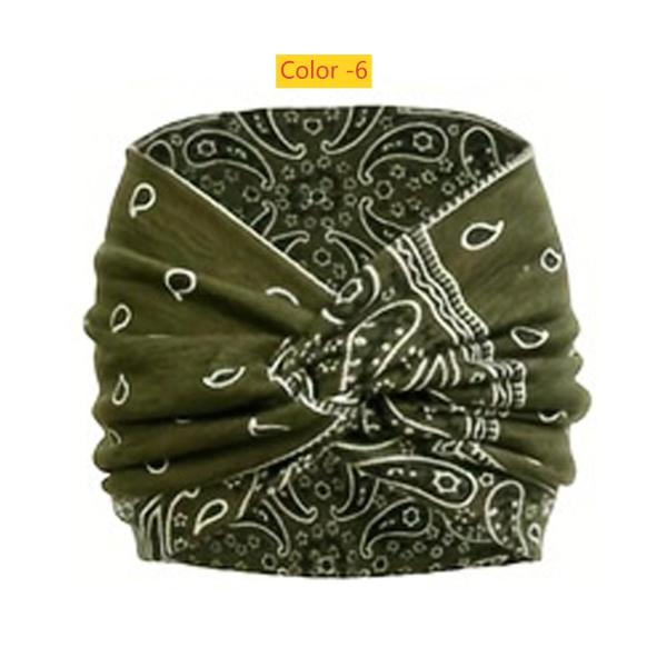 Printed headband, sports makeup, tied hair, crossed wide edge headband