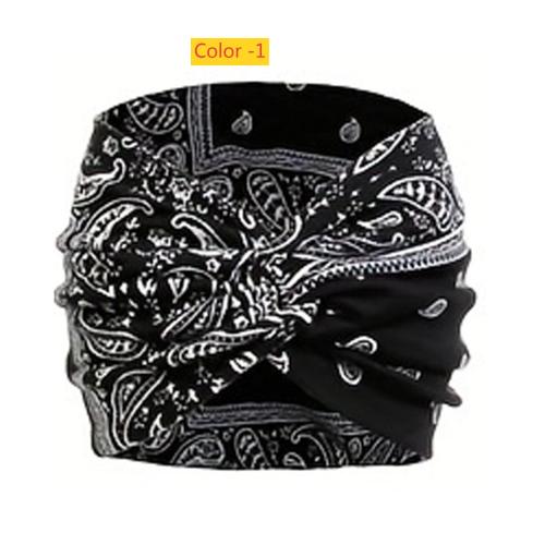 Printed headband, sports makeup, tied hair, crossed wide edge headband