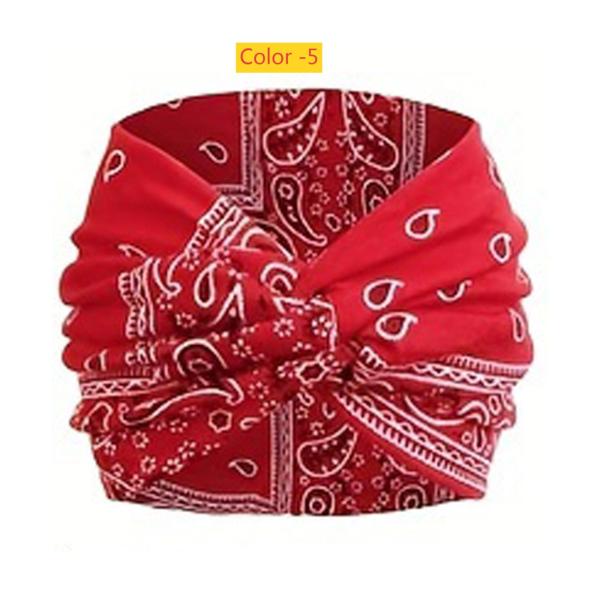 Printed headband, sports makeup, tied hair, crossed wide edge headband