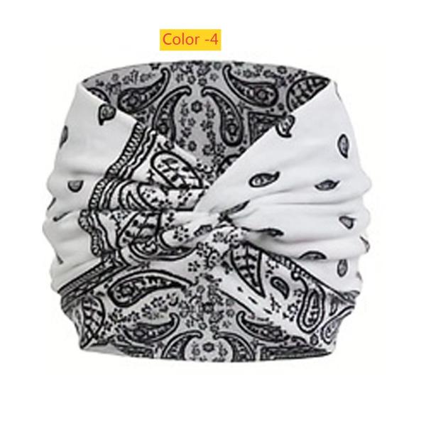 Printed headband, sports makeup, tied hair, crossed wide edge headband