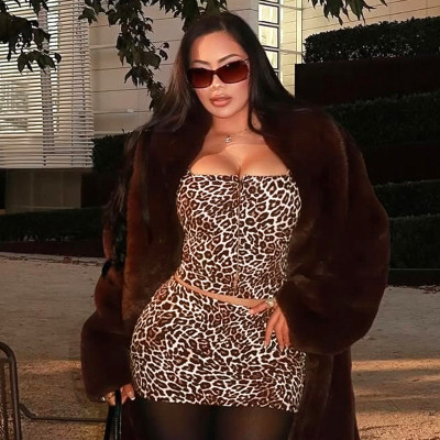 Leopard print sleeveless hook and loop vest top, hip hugging half skirt two-piece set