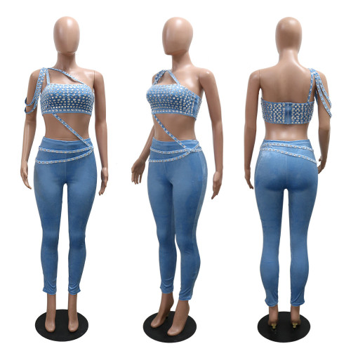 Two piece set of strapless and navel exposed short top paired with long pants