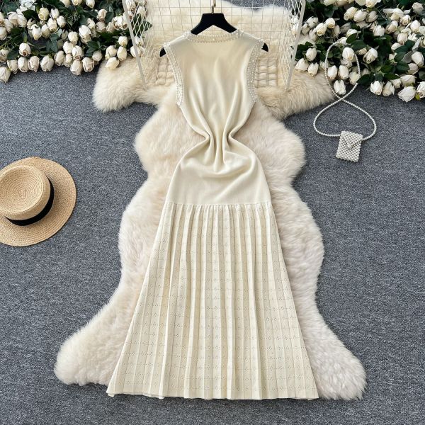 Nail bead round neck sleeveless knitted vest long skirt