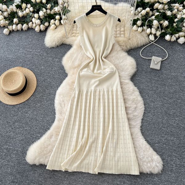 Nail bead round neck sleeveless knitted vest long skirt