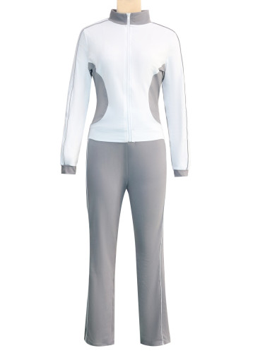 Two piece set of white spliced zipper top and pants