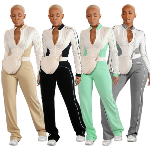 Two piece set of white spliced zipper top and pants