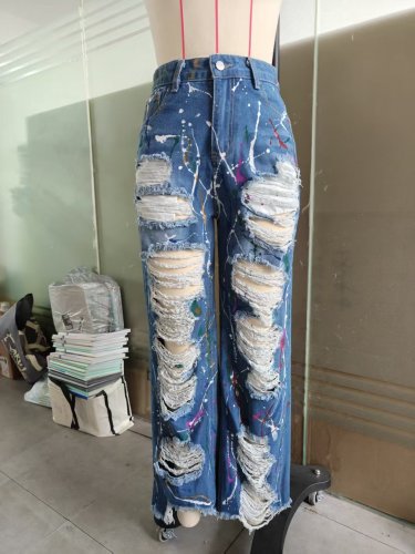 Graffiti printed ripped straight leg jeans