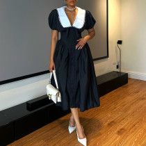 Bubble sleeve waist cinched black mid length dress