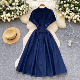 Deep V-neck cinched waist button pleated denim skirt