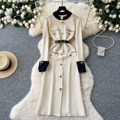 Long sleeved metal button waist cinching slit knitted long skirt