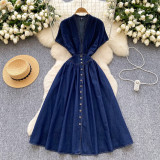 Deep V-neck cinched waist button pleated denim skirt