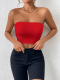 crop top and camisole one-piece dress with shoulder straps, worn as an outer top or bra top