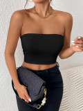 crop top and camisole one-piece dress with shoulder straps, worn as an outer top or bra top