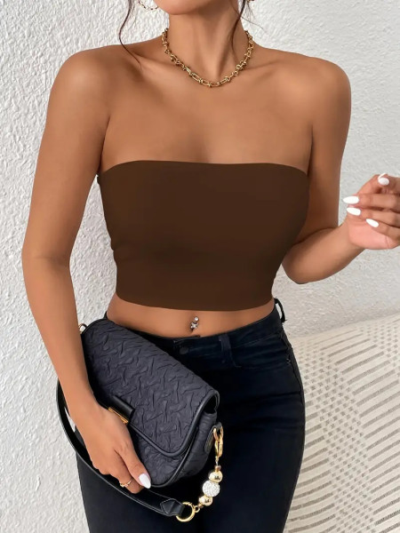 crop top and camisole one-piece dress with shoulder straps, worn as an outer top or bra top