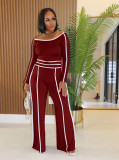 Two piece set of high waisted wide leg pants with one shoulder slanted collar elastic splicing
