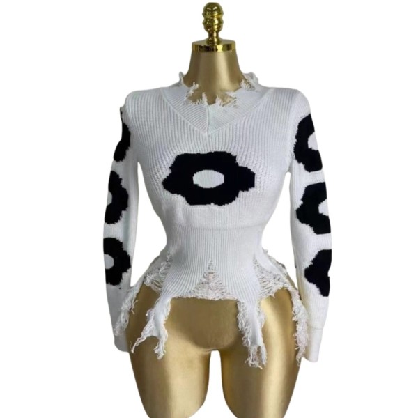 Cross hole tassel long sleeved loose fitting pullover knitted sweater