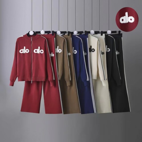 Two piece set of sports knitted long sleeved jacket and wide leg pants