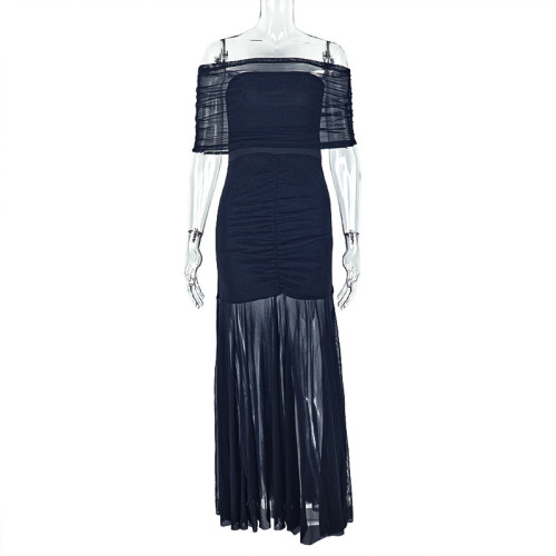Shoulderless pleated hip hugging skirt with a one neck strapless and slightly transparent dress