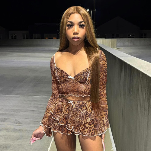 Leopard print bow wood ear long sleeved pleated short skirt set