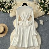 Metal buckle waist knit long sleeved short skirt