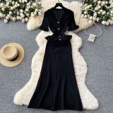 Metal buckle waist knitted short sleeved long skirt