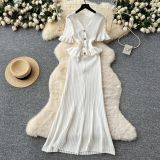 Metal buckle waist knitted short sleeved long skirt
