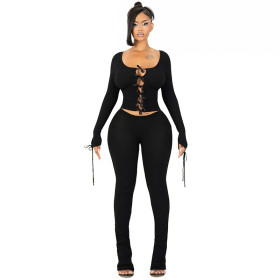 Long-sleeved bow-tied openwork belly-baring top + pants two-piece set