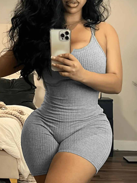 Strapless, sleeveless, backless, waist cinching, tight fitting, sports yoga, pit stripe jumpsuit
