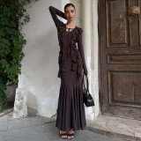Hip hugging ruffled long sleeved dress